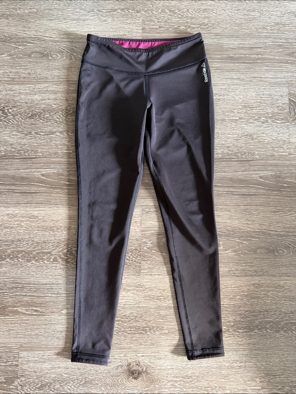 Reebok Women’s Black Leggings with Pink Inside Lining Accent